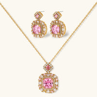Rose pink zirconia necklace and matching drop earrings with ornate geometric settings | Olaty
