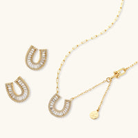 Gold horseshoe crystal necklace and matching stud earrings | Olaty