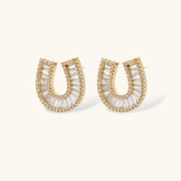Gold horseshoe crystal stud earrings with baguette-cut stones | Olaty
