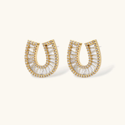 Gold horseshoe crystal stud earrings with baguette-cut stones | Olaty
