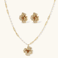 Golden Bloom crystal flower necklace and matching statement earrings | Olaty