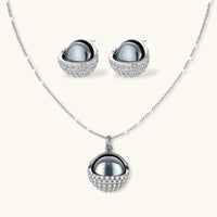 Cosmic sphere necklace and stud earrings set with dark centers and clear zirconia | Olaty