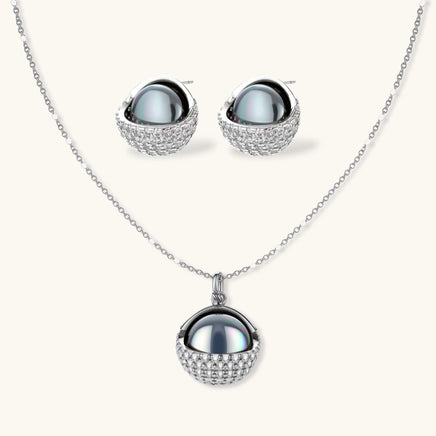 Cosmic sphere necklace and stud earrings set with dark centers and clear zirconia | Olaty