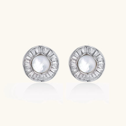 Radiant Pearl Halo statement stud earrings with luminous pearl centers and geometric crystal halos front view | Olaty