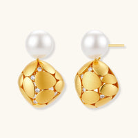 Gold-plated sterling silver drop earrings with white freshwater pearl studs and overlapping petal design with crystal accents