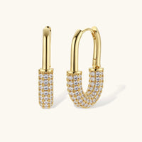 Golden Glow zirconia huggie hoop earrings in 14K gold-plated eco-brass shown in front and side view | Olaty