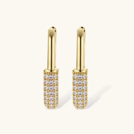 Golden Glow huggie hoop earrings featuring polished gold tops and pavé zirconia fronts | Olaty