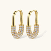 Golden Glow zirconia huggie hoop earrings in 14K gold-plated eco-brass front angled view | Olaty