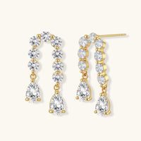 Linear Crystal gold-plated drop earrings with round zirconia and pear-cut accents angled view | Olaty