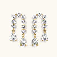 Linear Crystal drop earrings with cascading zirconia and pear-shaped stones front view | Olaty
