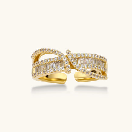 Infinity Twist adjustable ring with brilliant zirconia and polished 14K gold-plated eco-brass front view | Olaty