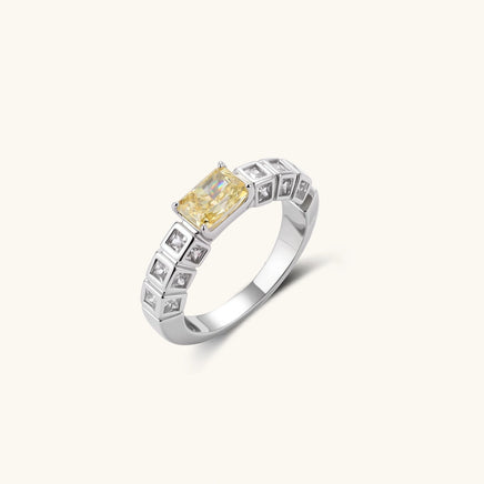 Golden Geometry yellow zirconia Art Deco statement ring with geometric clear zirconia accents angled view | Olaty