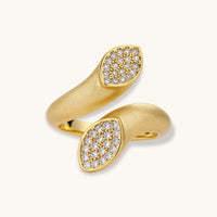 Dual Spark adjustable gold ring with zirconia pavé oval ends angled view | Olaty