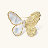 Ethereal Butterfly mother-of-pearl statement brooch with gold-plated wings and zirconia center detail | Olaty