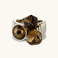 Front view of golden-brown zirconia cocktail ring with round and geometric stones | Olaty