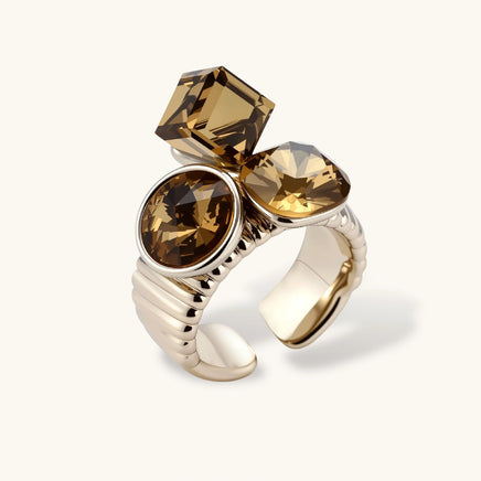 Golden-brown mixed-cut zirconia statement ring with three sculptural stones | Olaty