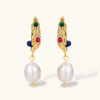 Front view of gold sculptural hoop earrings with colorful gems and baroque freshwater pearls | Olaty
