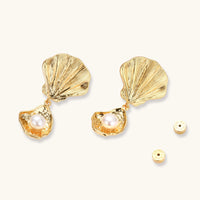 Ocean shell pearl drop earrings shown with post backs and sculpted gold shell details | Olaty
