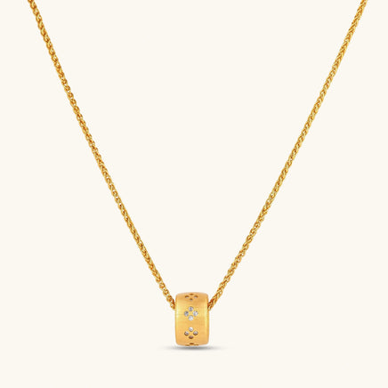Stardust gold necklace with brushed sliding ring pendant and scattered sparkling crystal accents | Olaty