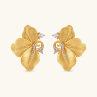 Front view of Bloom gold flower stud earrings with sculpted petals and brilliant cubic zirconia details | Olaty