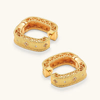 Baroque huggie hoop earrings showing sculptural openwork sides and ribbed gold panels | Olaty