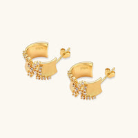 Stardust Scatter Hoop Earrings showing curved brushed-gold hoops with cubic zirconia clusters and post-back construction | Olaty