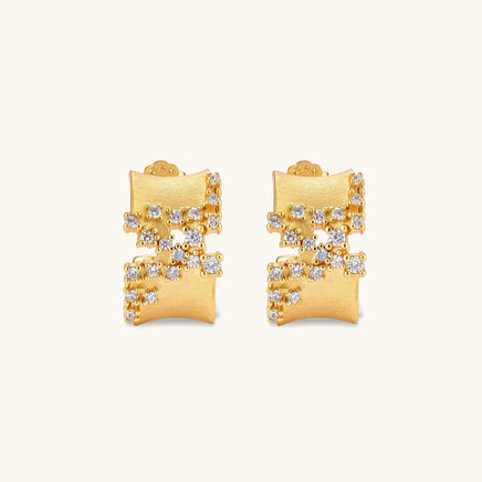 Front view of Stardust Scatter Hoop Earrings with brushed gold texture and scattered cubic zirconia clusters | Olaty
