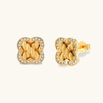 Braided clover halo stud earrings with brushed gold texture and cubic zirconia border in front and angled views | Olaty