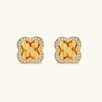 Front view of braided clover stud earrings with textured gold center and sparkling cubic zirconia halo | Olaty