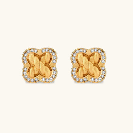 Front view of braided clover stud earrings with textured gold center and sparkling cubic zirconia halo | Olaty