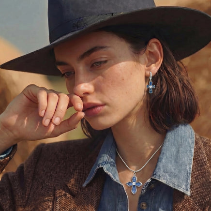 Blue Denim Cross Pendant Necklace styled with a silver-tone chain and matching denim cross earring | Olaty