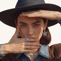 Blue denim butterfly statement ring styled with coordinating butterfly jewelry | Olaty