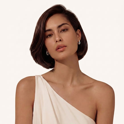  Model wearing Starlit pavé huggie hoop earrings | Olaty