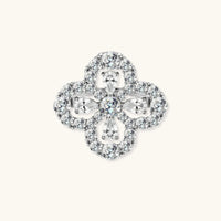 Top view of Lucky Clover Ring with brilliant moissanite stones arranged in an ornate four-leaf clover design | Olaty