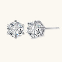 GRA certified round moissanite stud earrings in polished 925 sterling silver six-prong settings | Olaty