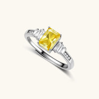 GRA certified yellow moissanite radiant three stone ring angled view in 925 sterling silver | Olaty