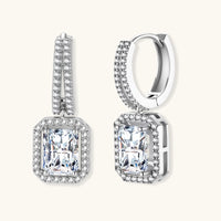 GRA certified emerald cut moissanite drop earrings with halo setting and huggie hoops | Olaty