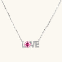 GRA certified pink moissanite diamond LOVE necklace in polished 925 sterling silver front view | Olaty