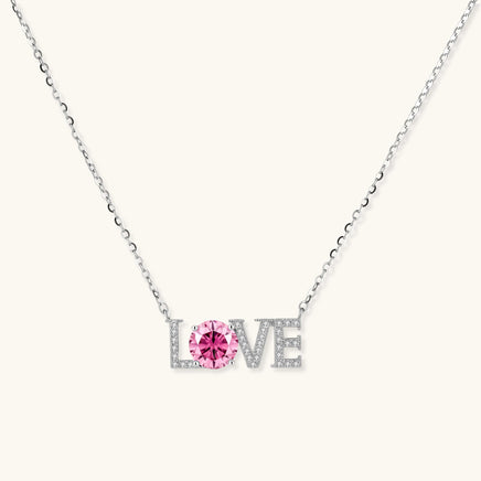 GRA certified pink moissanite diamond LOVE necklace in polished 925 sterling silver front view | Olaty