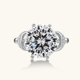 Top view of Promise Bow Statement Ring with large round moissanite center stone and sculptural pavé bow setting | Olaty