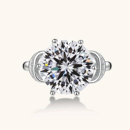 Top view of Promise Bow Statement Ring with large round moissanite center stone and sculptural pavé bow setting | Olaty