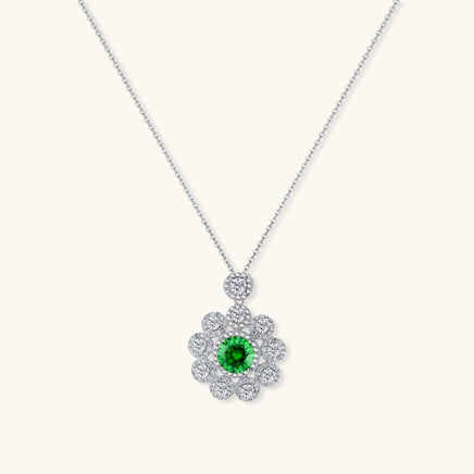 Front view of Green Moissanite Diamond Daisy Bloom Necklace with round green center stone and sparkling floral halo | Olaty