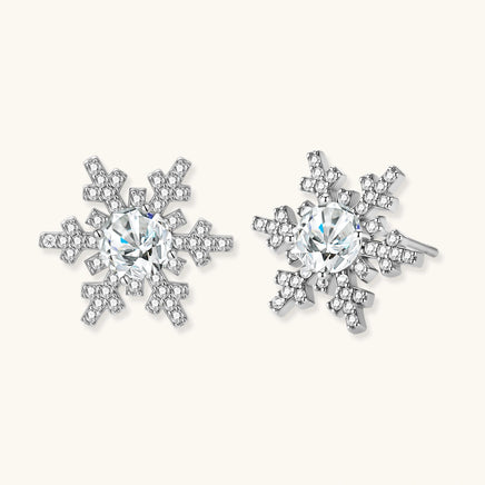 Moissanite Diamond Winter Spark Snowflake Stud Earrings with sparkling snowflake settings in polished sterling silver | Olaty