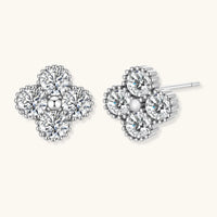 GRA certified moissanite diamond quatrefoil stud earrings in polished 925 sterling silver, front and angled view | Olaty