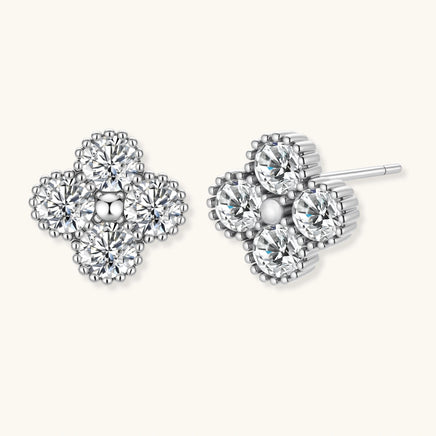 GRA certified moissanite diamond quatrefoil stud earrings in polished 925 sterling silver, front and angled view | Olaty