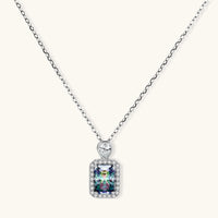 Front view of Prism Dreams Necklace with rectangular moissanite center stone, sparkling halo and polished sterling silver setting | Olaty