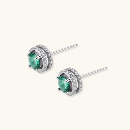 Side view of Green Moissanite Diamond Emerald Spark Halo Stud Earrings with sterling silver posts | Olaty