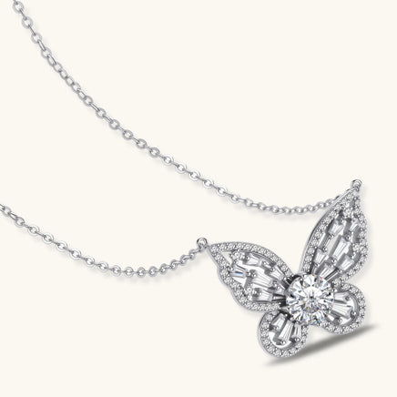 Radiant butterfly moissanite necklace with geometric crystal wings and sterling silver chain angled view | Olaty