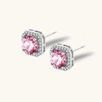 Pink moissanite stud earrings with sparkling halo and geometric sterling silver setting | Olaty