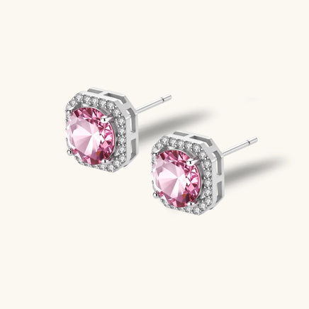 Pink moissanite stud earrings with sparkling halo and geometric sterling silver setting | Olaty